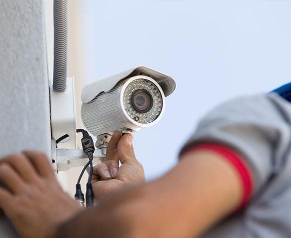 Professional CCTV Technician Working — CCTV Installations in Muswellbrook, NSW Professional CCTV Technician Working — CCTV Installations in Muswellbrook, NSW