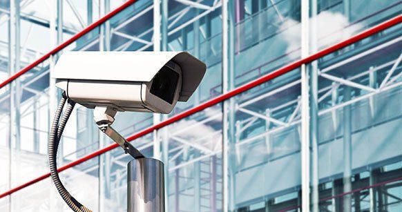 Security Camera in a Modern Building — Our Clients in Muswellbrook, NSW Security Camera in a Modern Building — Our Clients in Muswellbrook, NSW