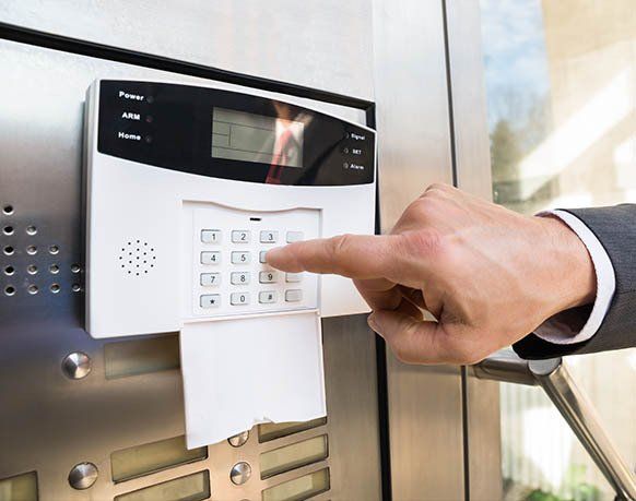 Entering Code in Security System — Security Alarms in Muswellbrook, NSW Entering Code in Security System — Security Alarms in Muswellbrook, NSW