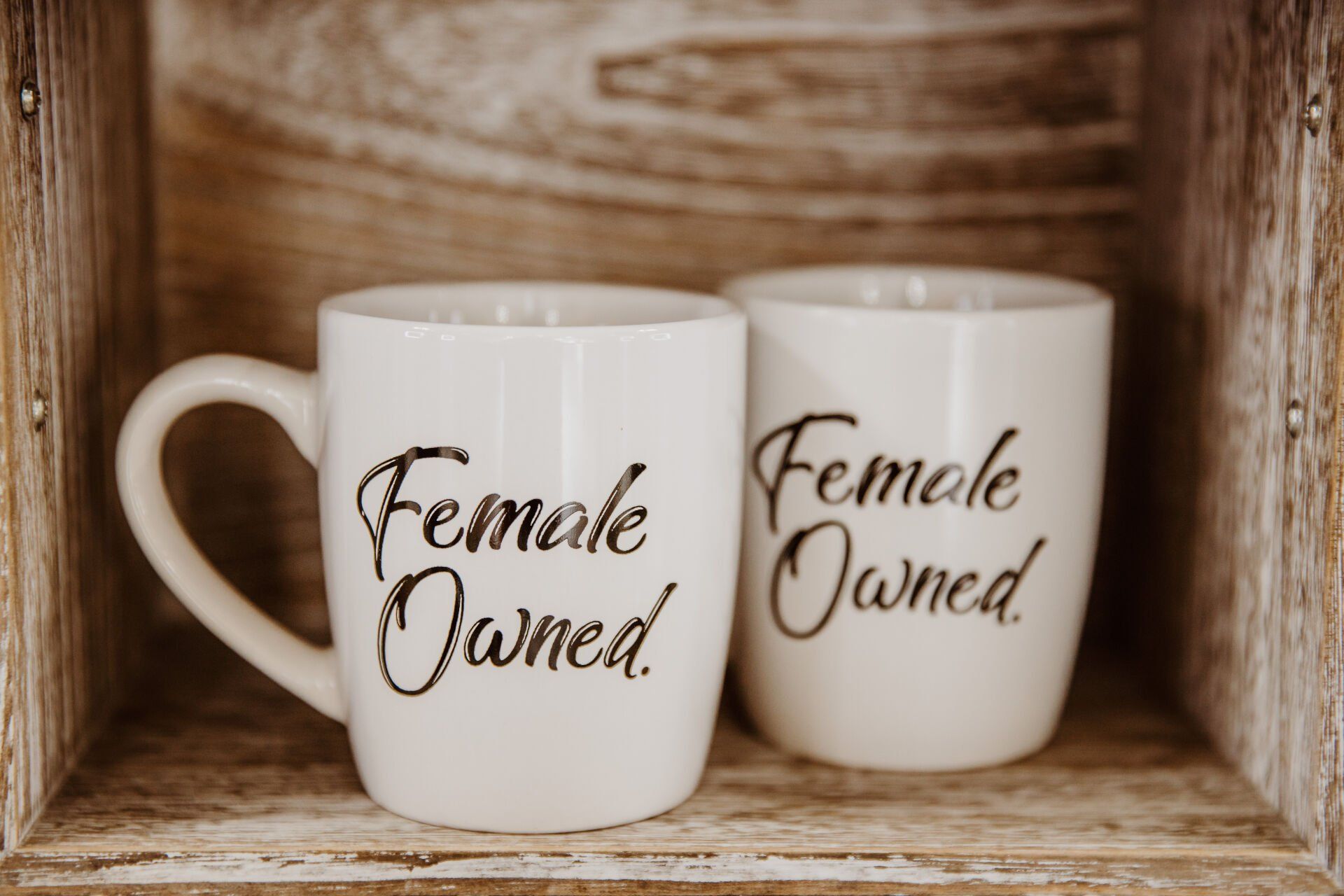 Two white mugs with 