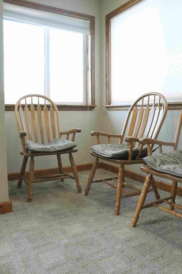 Two wooden chair — Restorative Dentistry in Woodland Park,CO