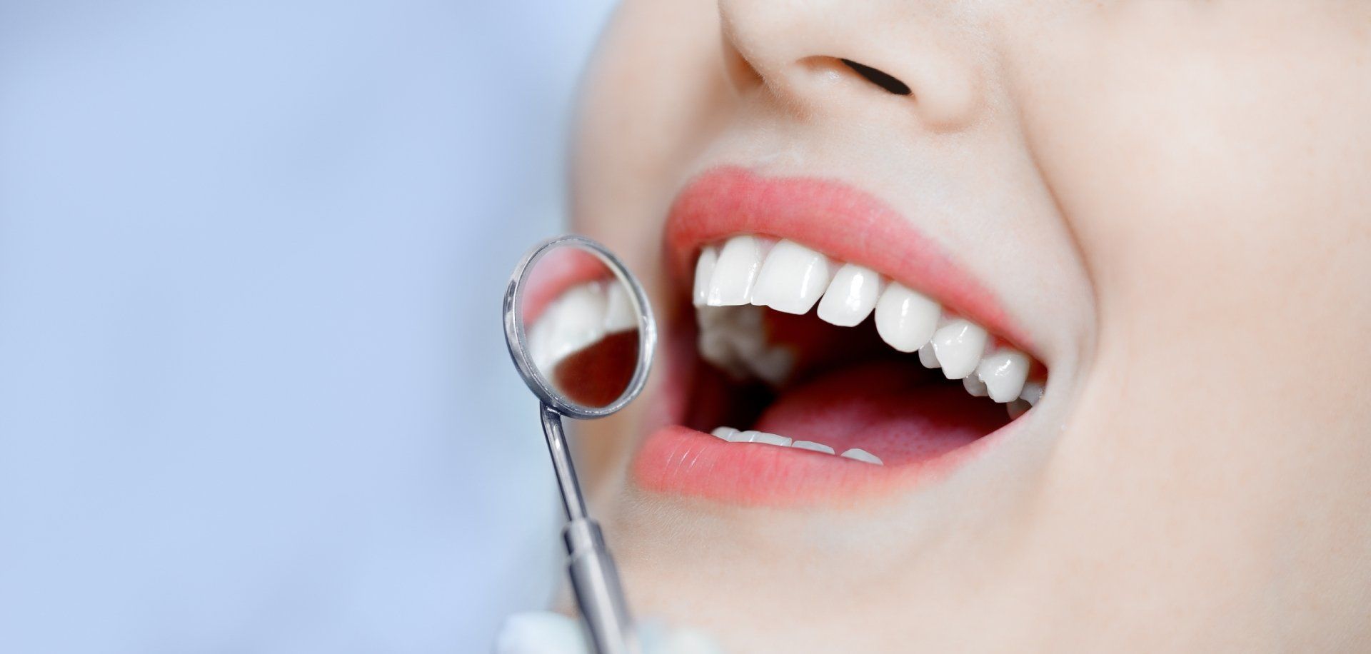 woman checking her white teeth