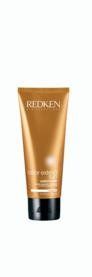 A tube of redken hair product on a white background.