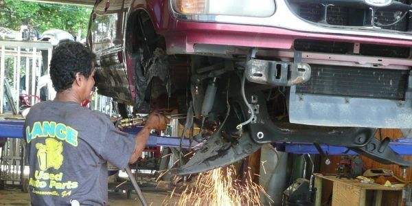 A Mechanic Reassembling Car Parts — Lawrenceville, GA — Lance Used Auto Parts A Mechanic Reassembling Car Parts — Lawrenceville, GA — Lance Used Auto Parts