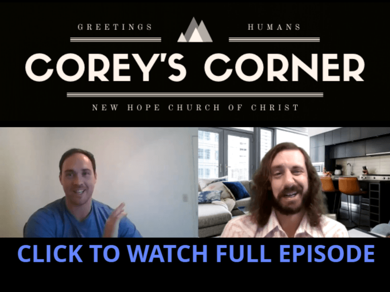 Two men are sitting in front of a screen that says corey 's corner
