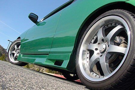 Green Lowered Car — Automotive Repairs in Chula Vista, CA Green Lowered Car — Automotive Repairs in Chula Vista, CA