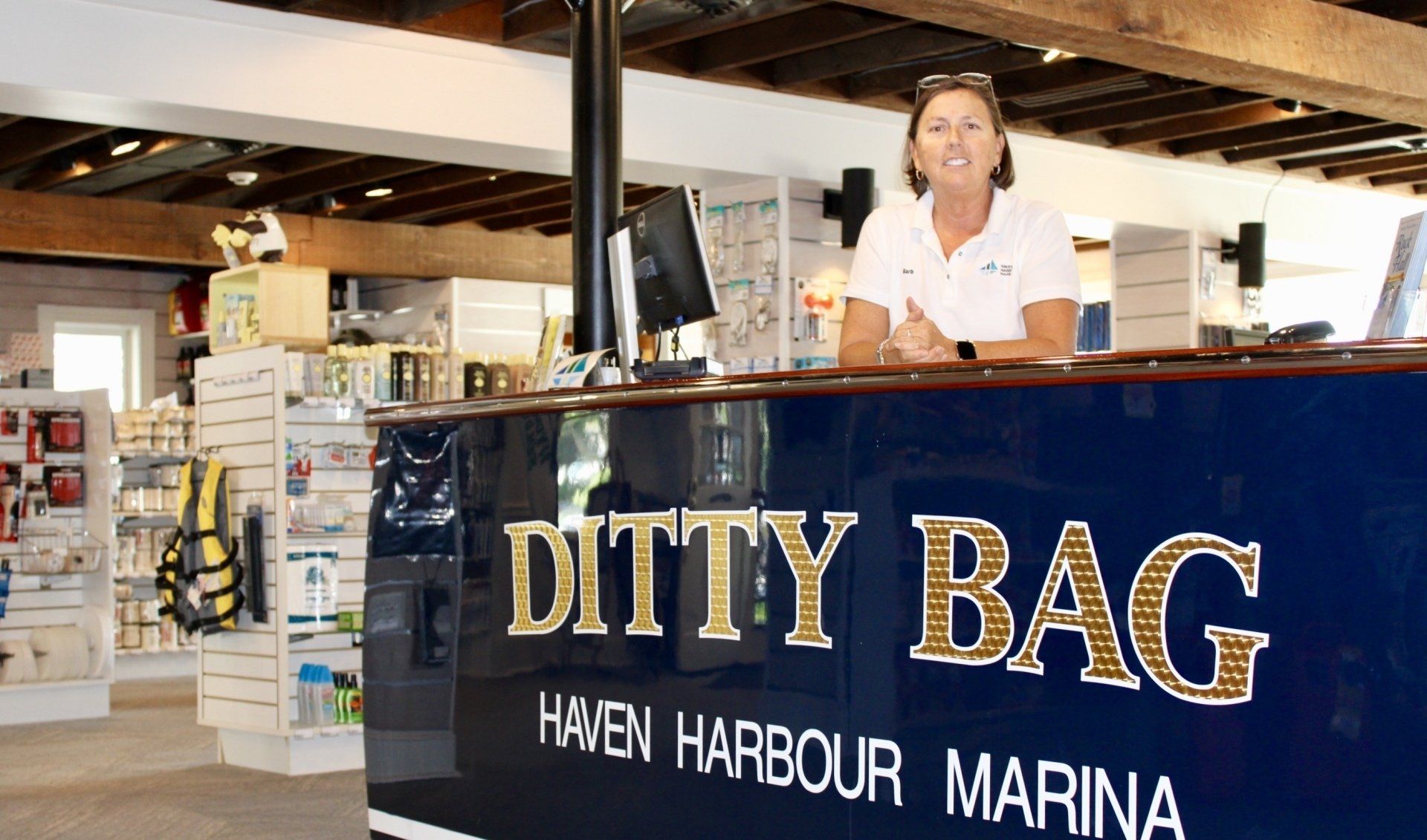Store clerk at business point of sale counter