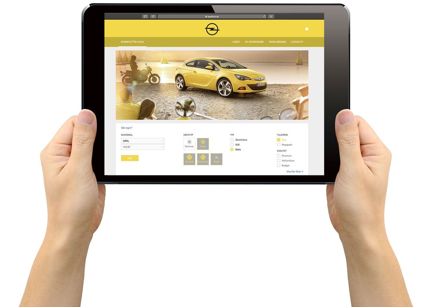 A person is holding a tablet with a yellow car on the screen