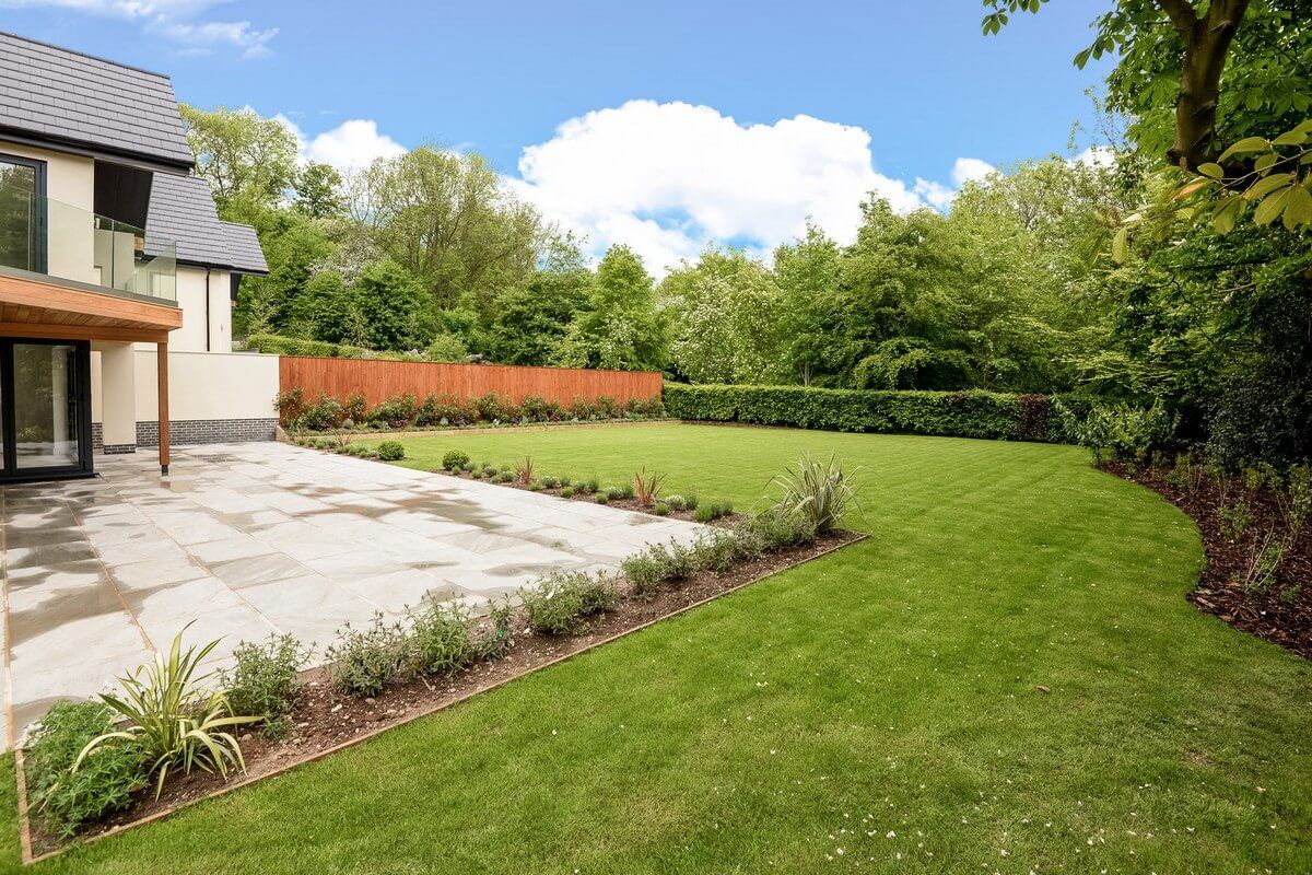 side view of corner garden green grass field