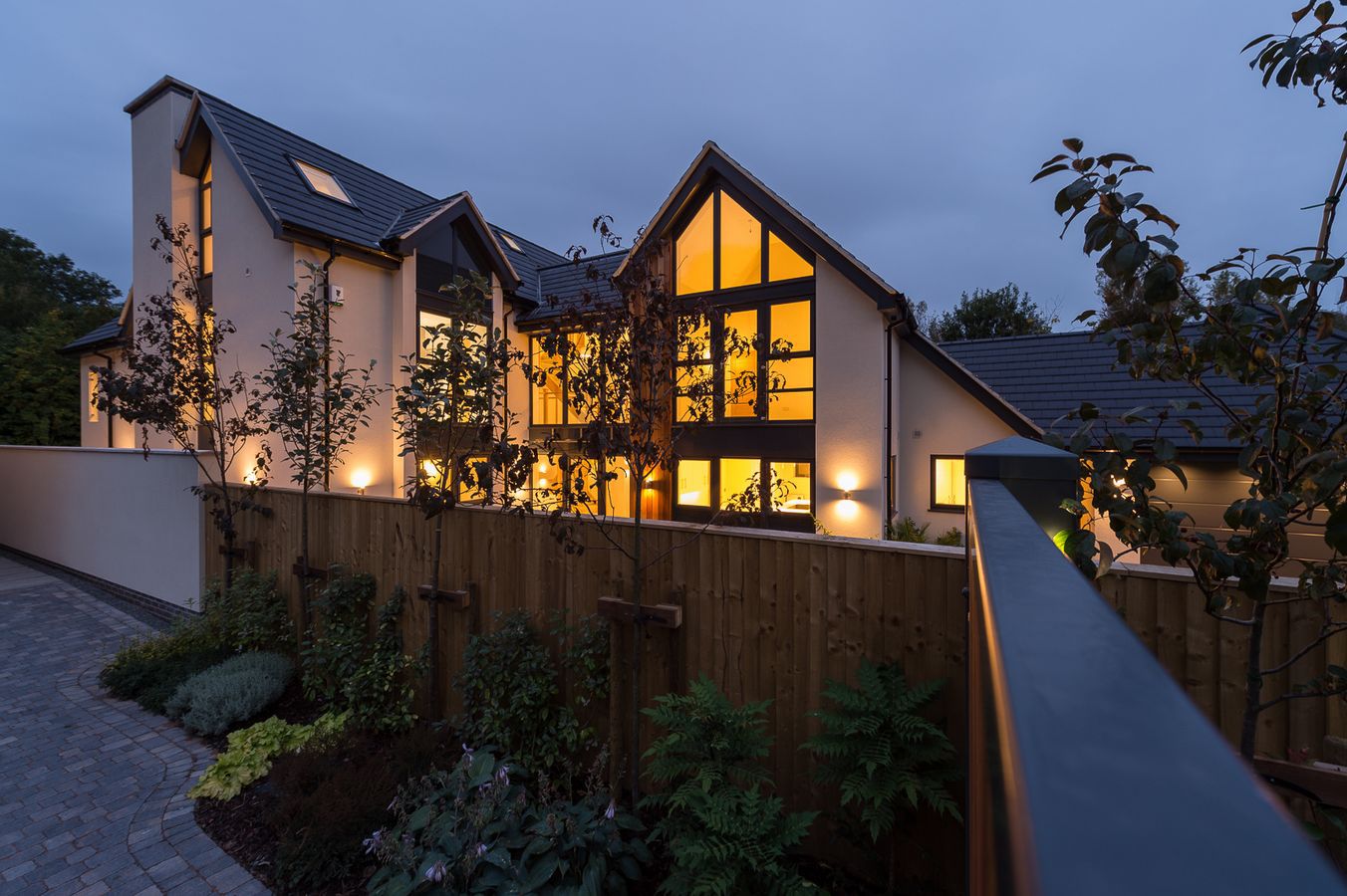 tawnycourt bulcote house viewed over the hedge at night