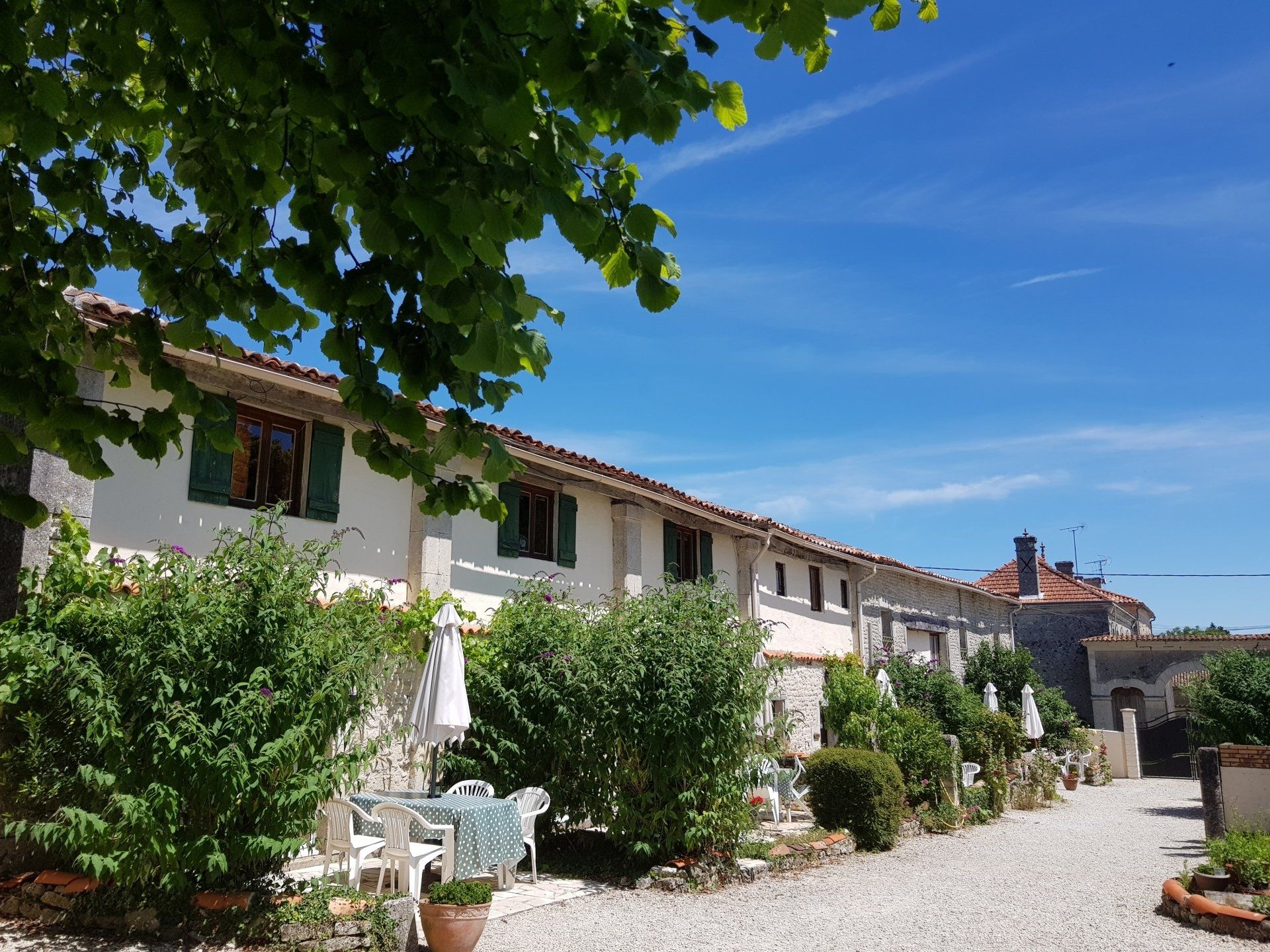 Stone holiday cottages on a sunny day