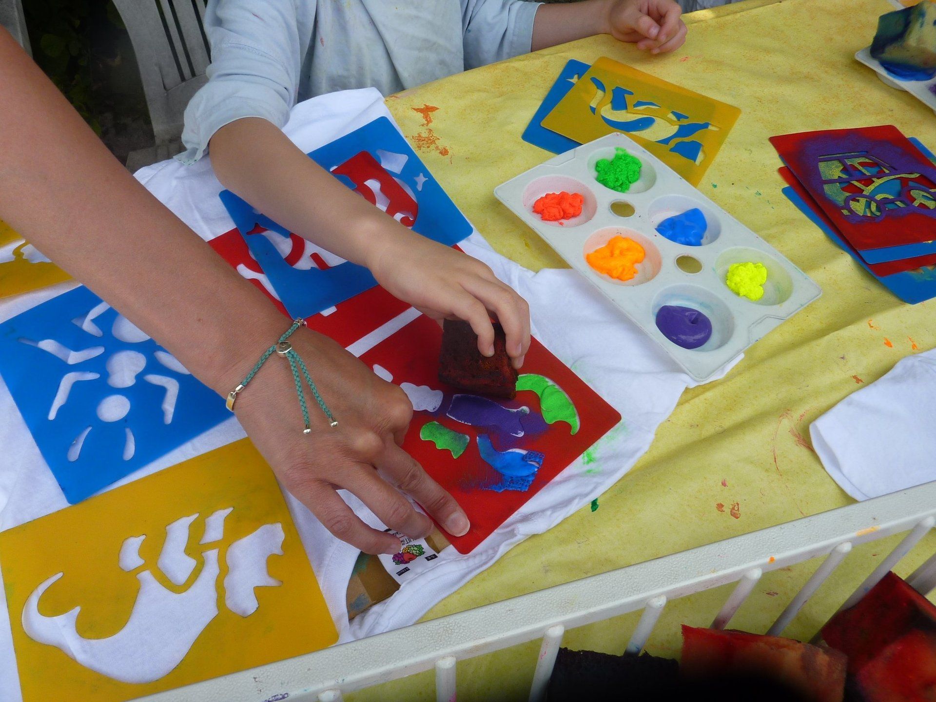 Fabric painting using stencils