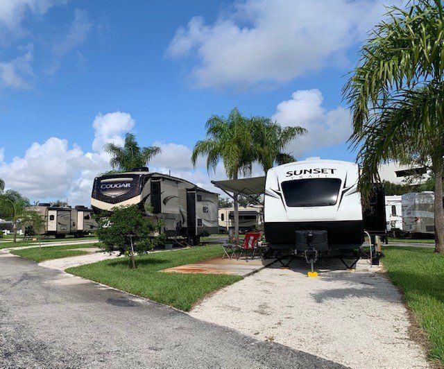 Camper Car On Beach — Delray Beach, FL — Del-Raton RV Park & Trailer Sales Camper Car On Beach — Delray Beach, FL — Del-Raton RV Park & Trailer Sales
