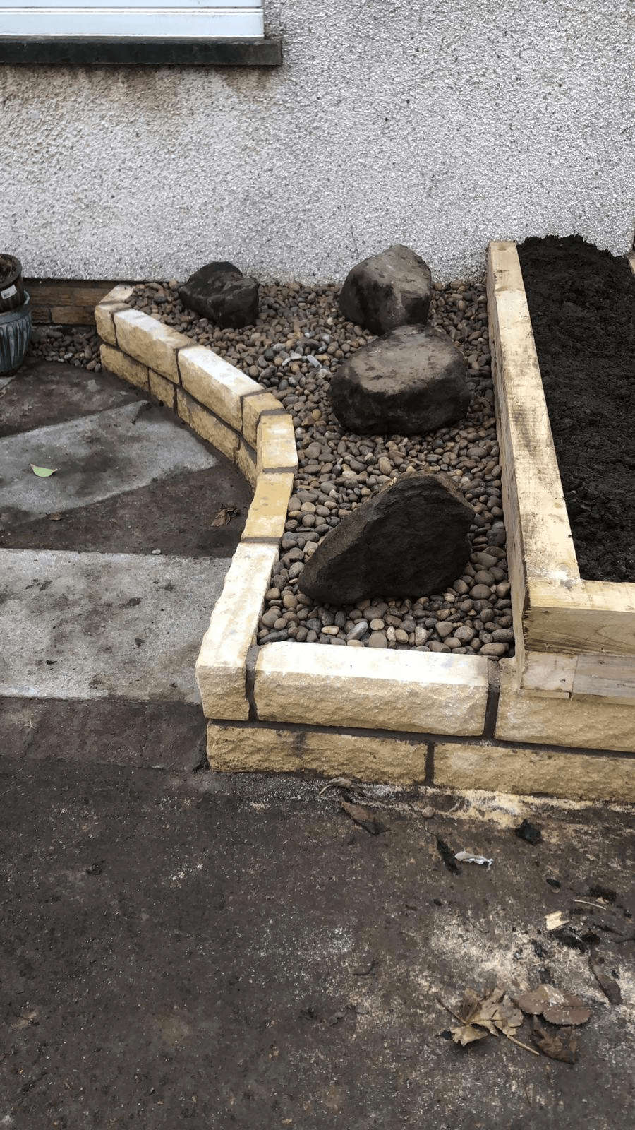 brick pavement with 3 rocks