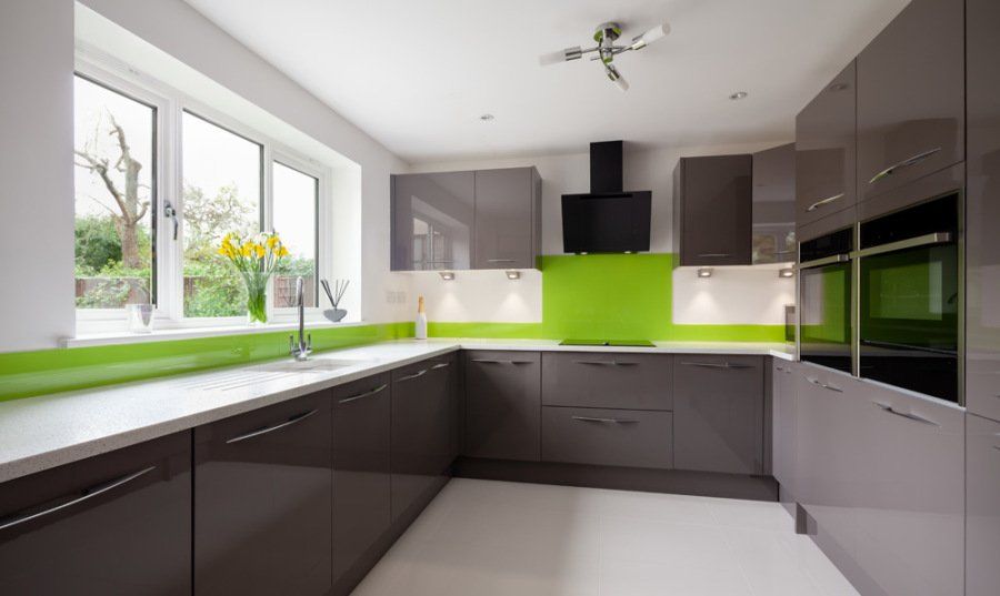 kitchen with green backsplash