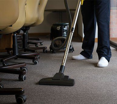 Vacuuming the Carpet of an Office — College Place, WA — MBG Cleaning Services Vacuuming the Carpet of an Office — College Place, WA — MBG Cleaning Services