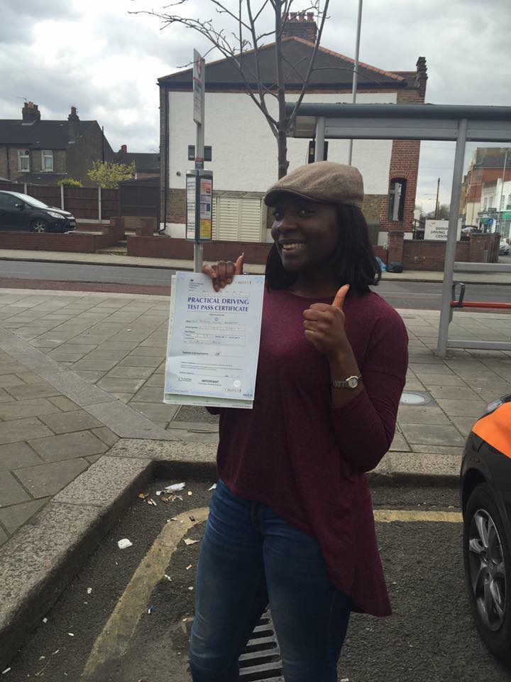 a women holding driving licence