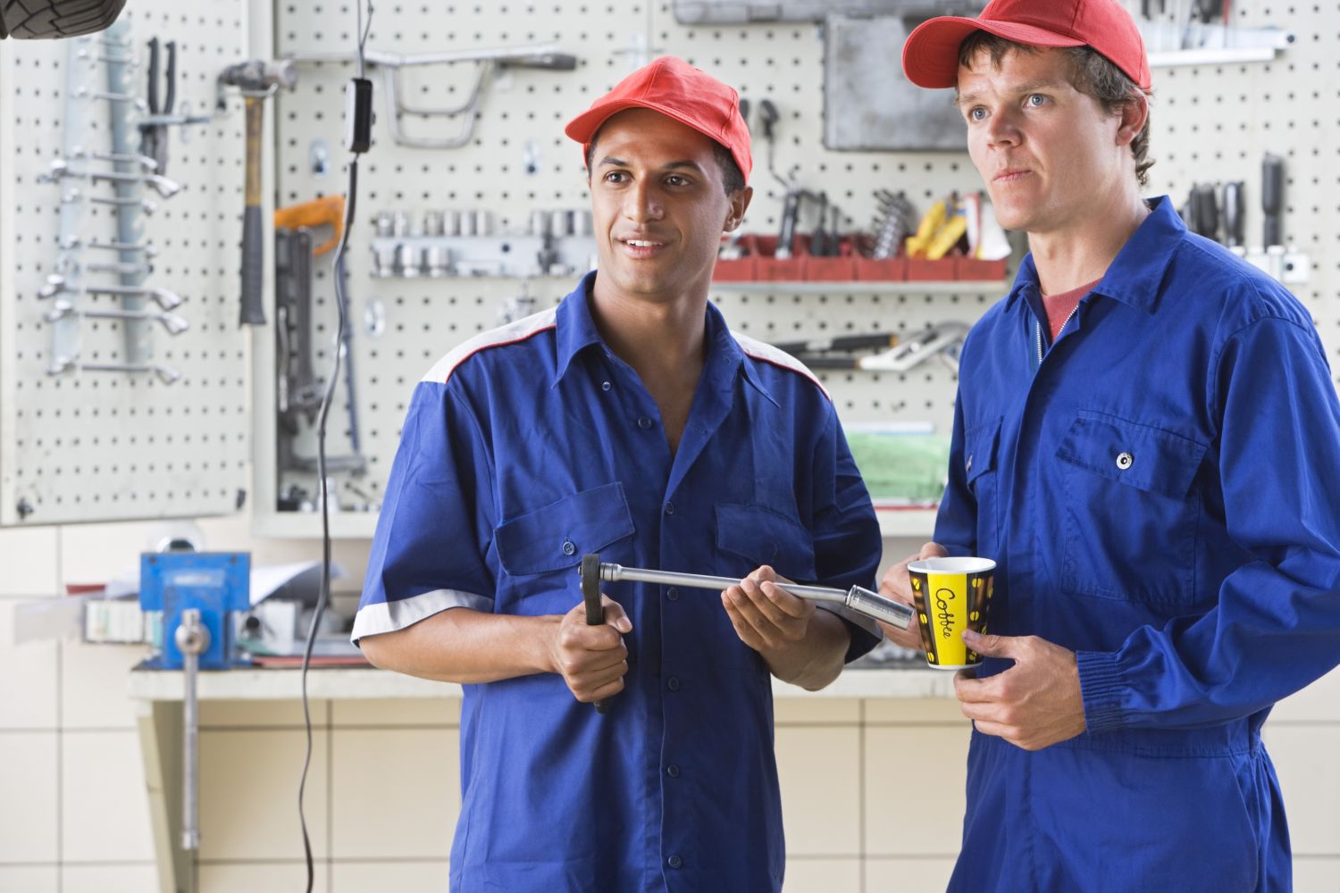 team of mechanics in boy repair shop