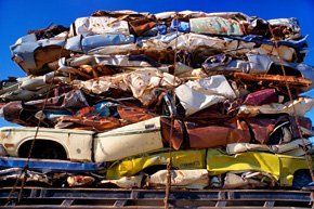 Looking to scrap your car? Call Car Collection Services pile of Scrap cars