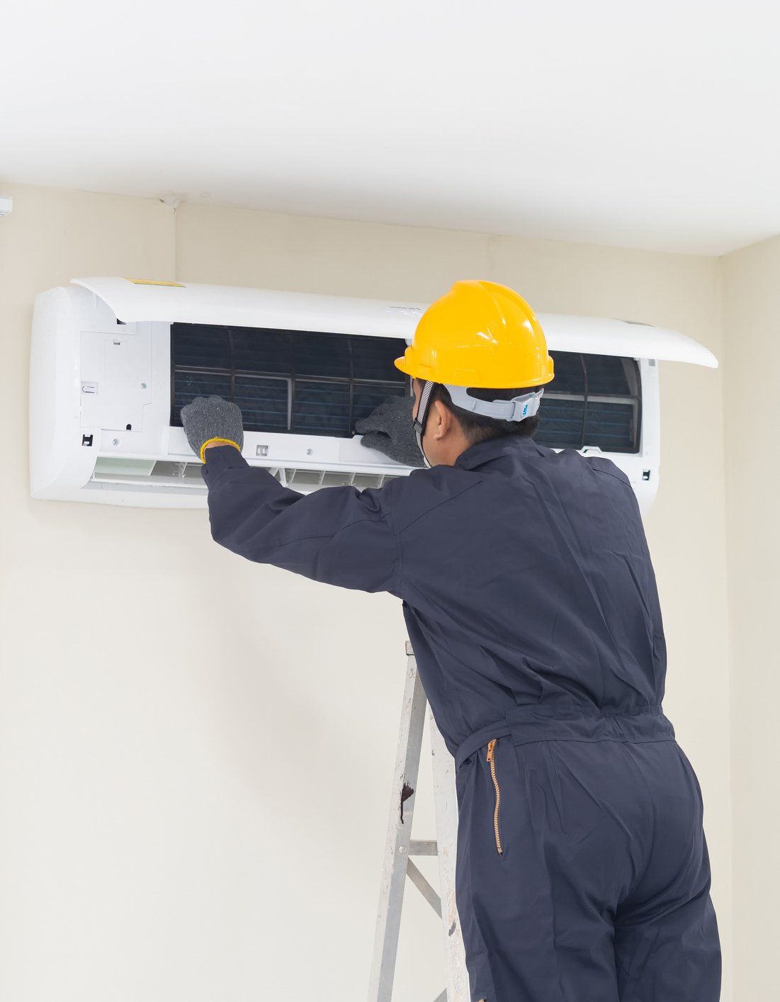 A Man Repairing the Cooler — Douglasville, GA — Douglasville Heating and Air and Appliance A Man Repairing the Cooler — Douglasville, GA — Douglasville Heating and Air and Appliance
