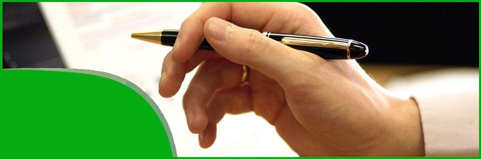 holding a pen