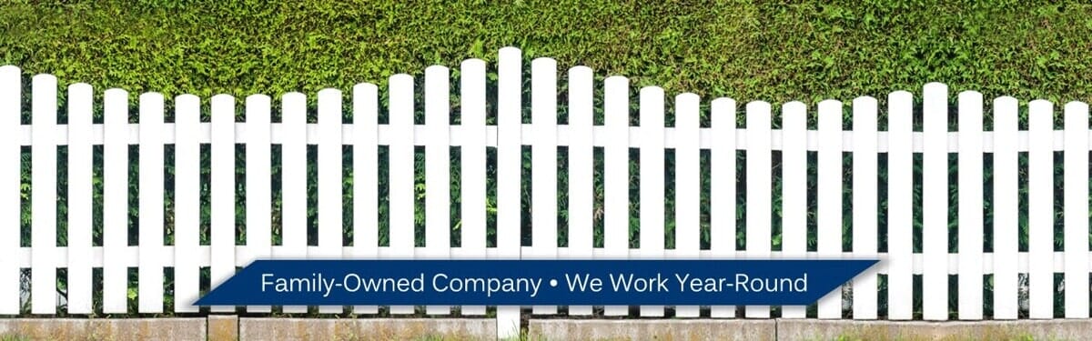White Fence in front of Hedge - Toledo, OH White Fence in front of Hedge - Toledo, OH