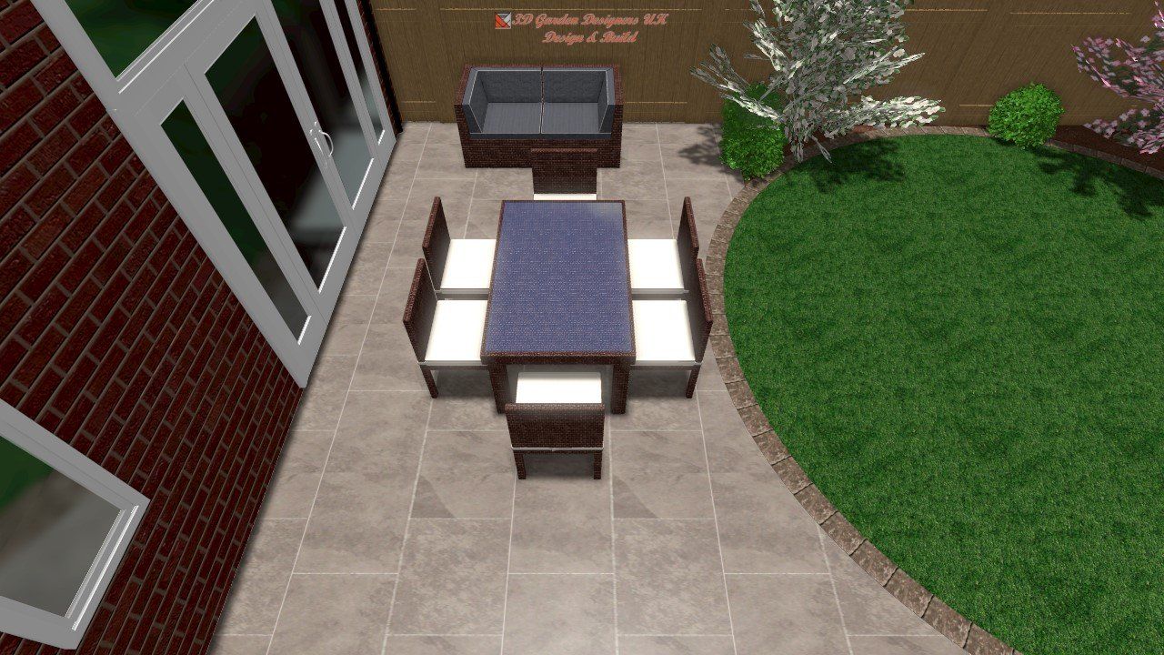 Patio with outdoor dining set and grill next to a grassy area, view from above.