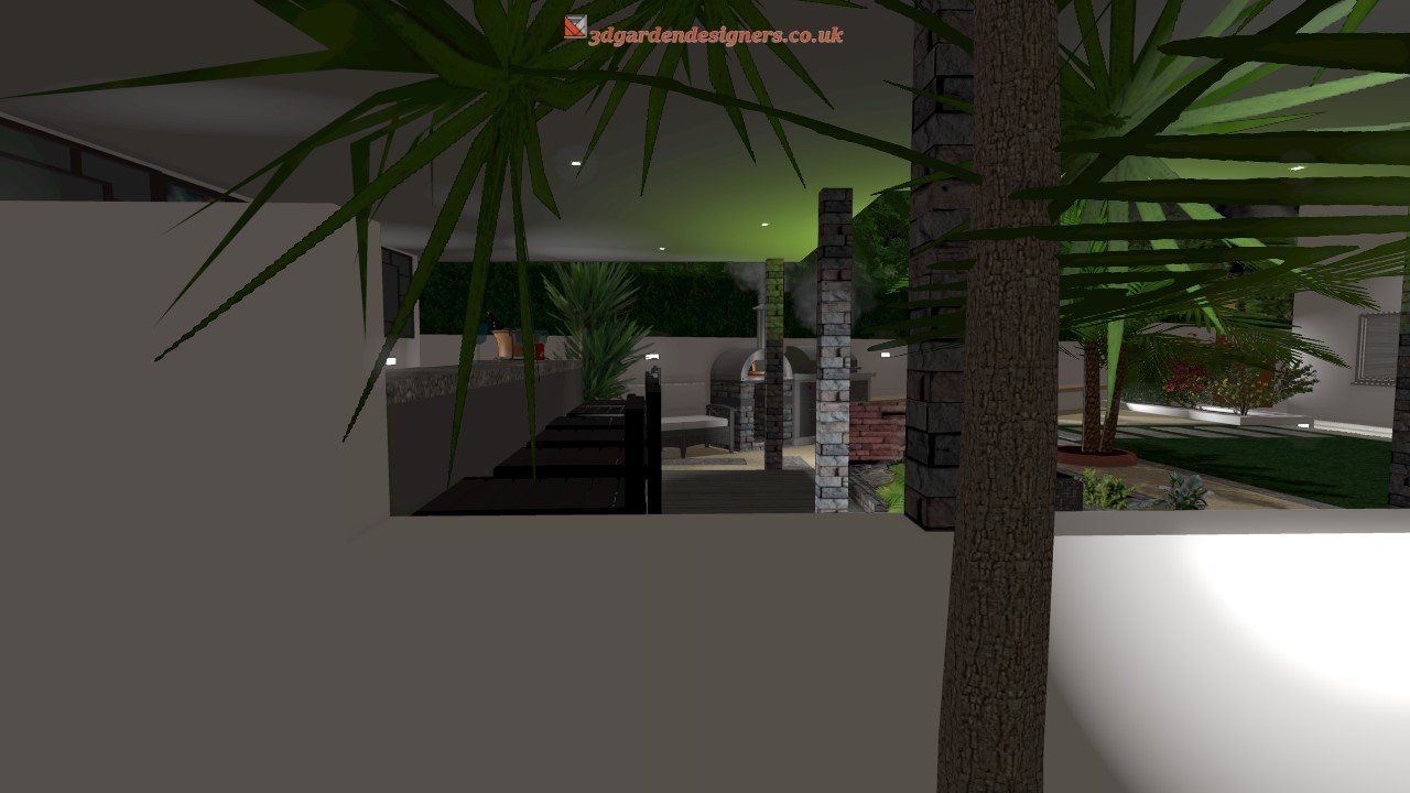 View of an indoor space through a tree. Features white walls, green plants, and outdoor furniture.