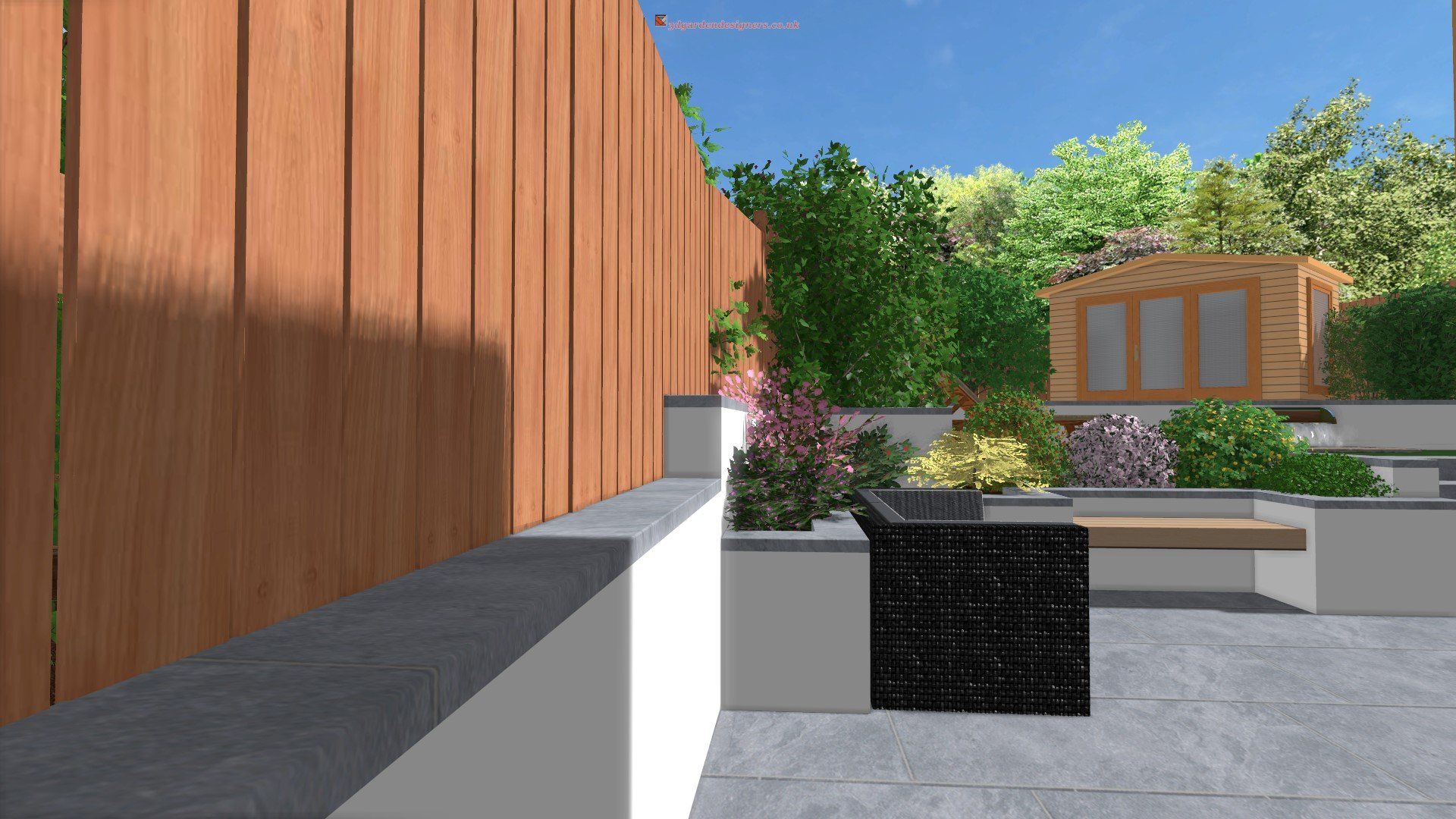 Wooden fence, patio with planters, small shed, and blue sky.