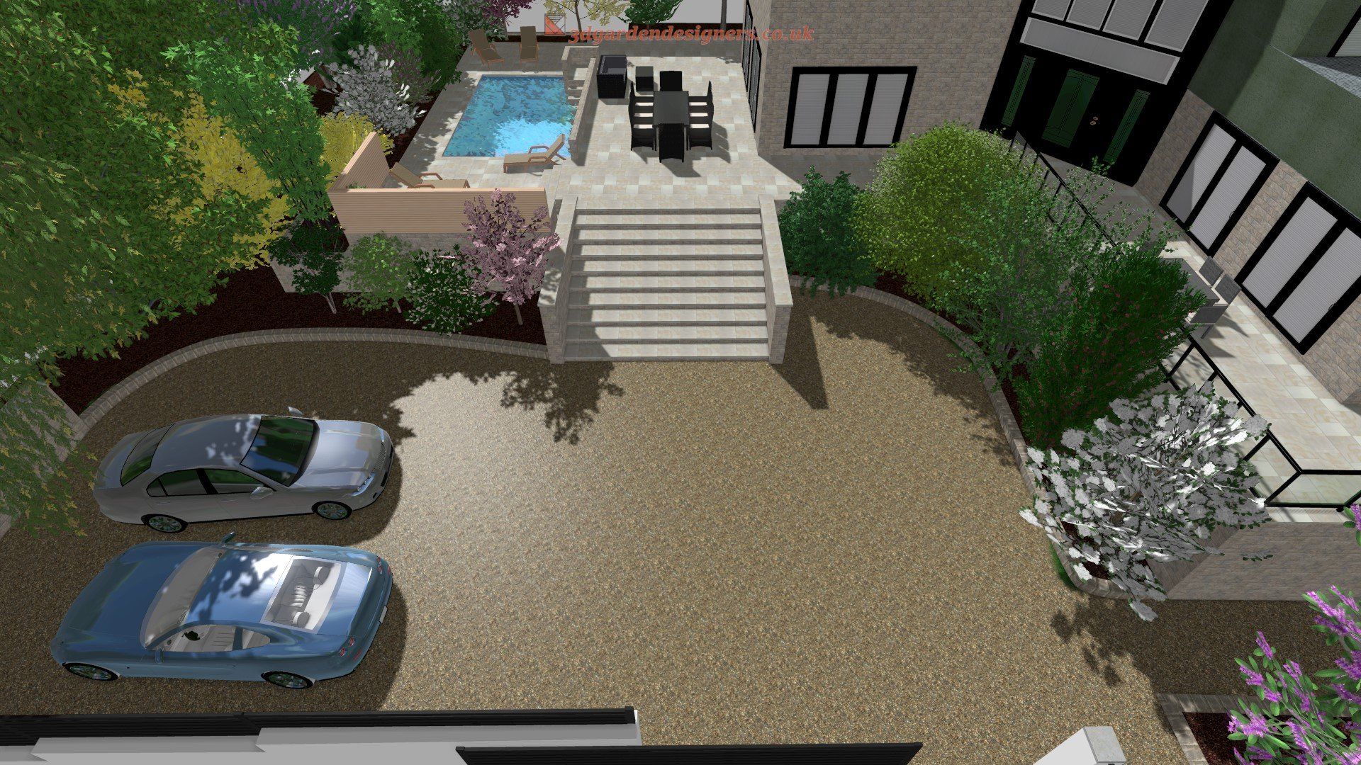 Aerial view of a home with a driveway, pool, patio, and two cars parked.