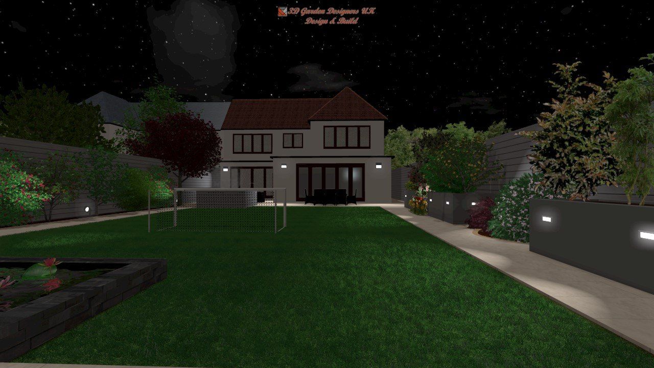 Nighttime view of a modern house with a green lawn, garden, and walkway, illuminated by outdoor lights.