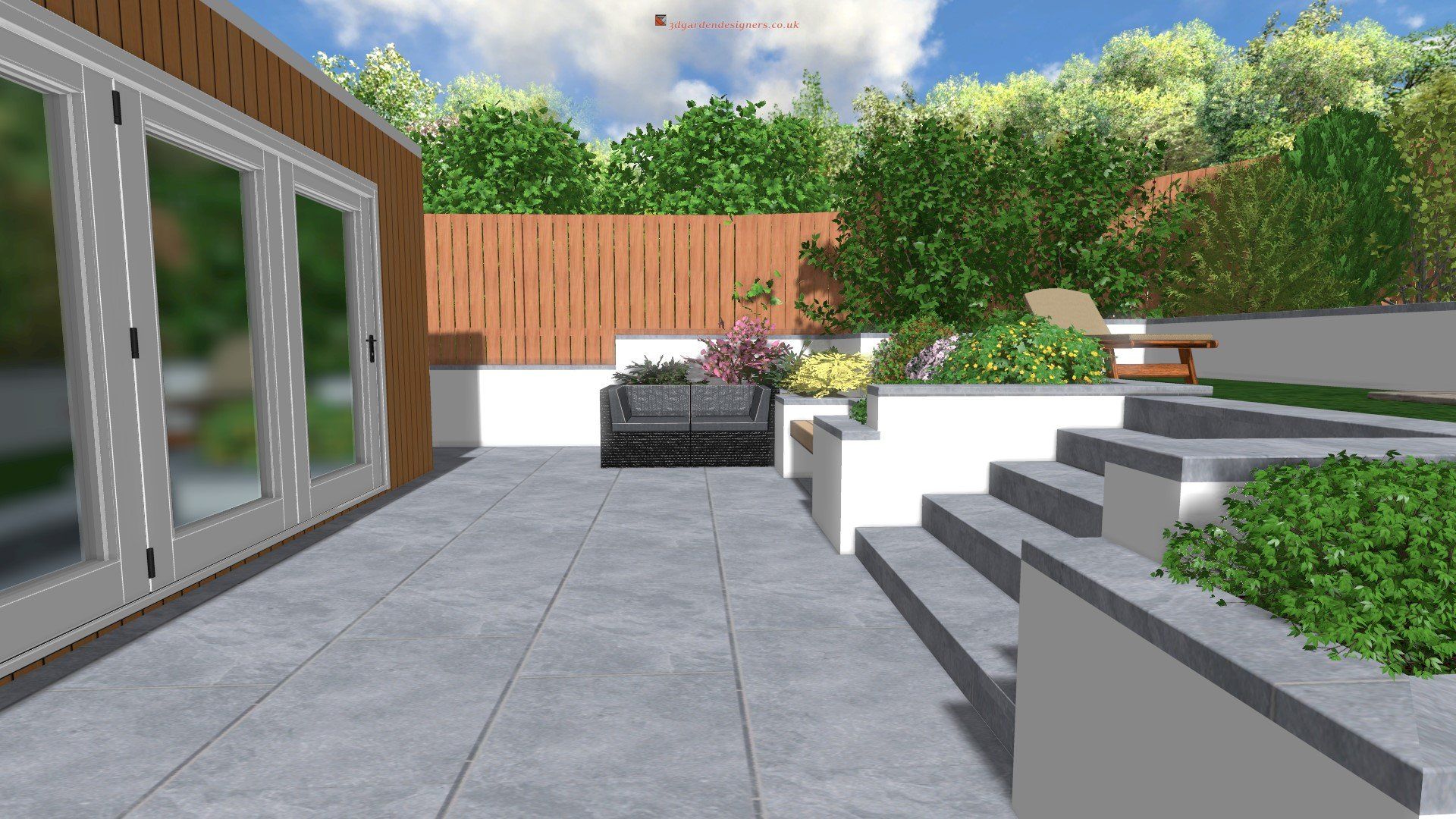 Patio with gray tiles, steps, and built-in planters. A sofa and lush greenery are against a wooden fence.