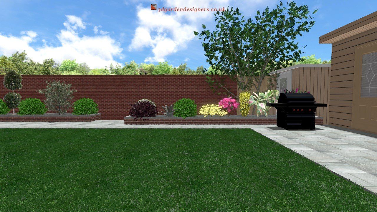 Backyard with green grass, flowerbeds, and a grill under a blue sky.