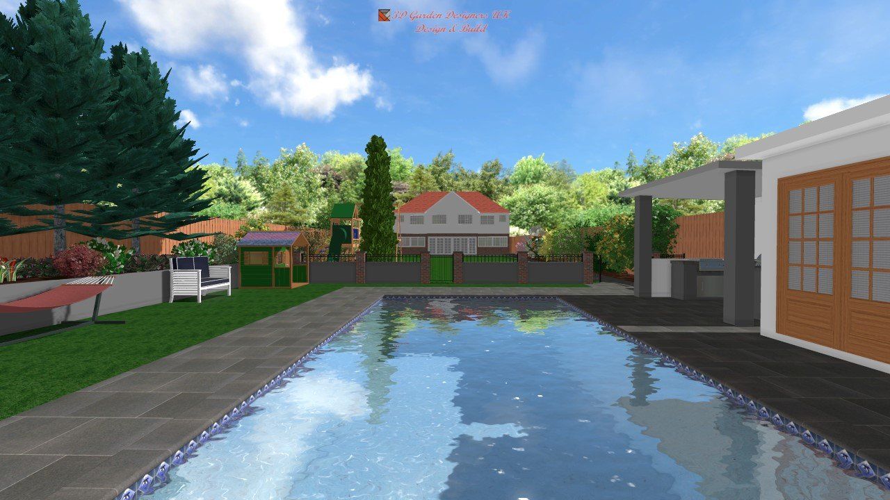 Pool with water reflecting the sky, flanked by a house and greenery.