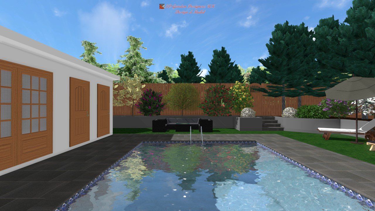 Backyard with a pool, patio, and trees under a blue sky; sunlight reflects on the water.