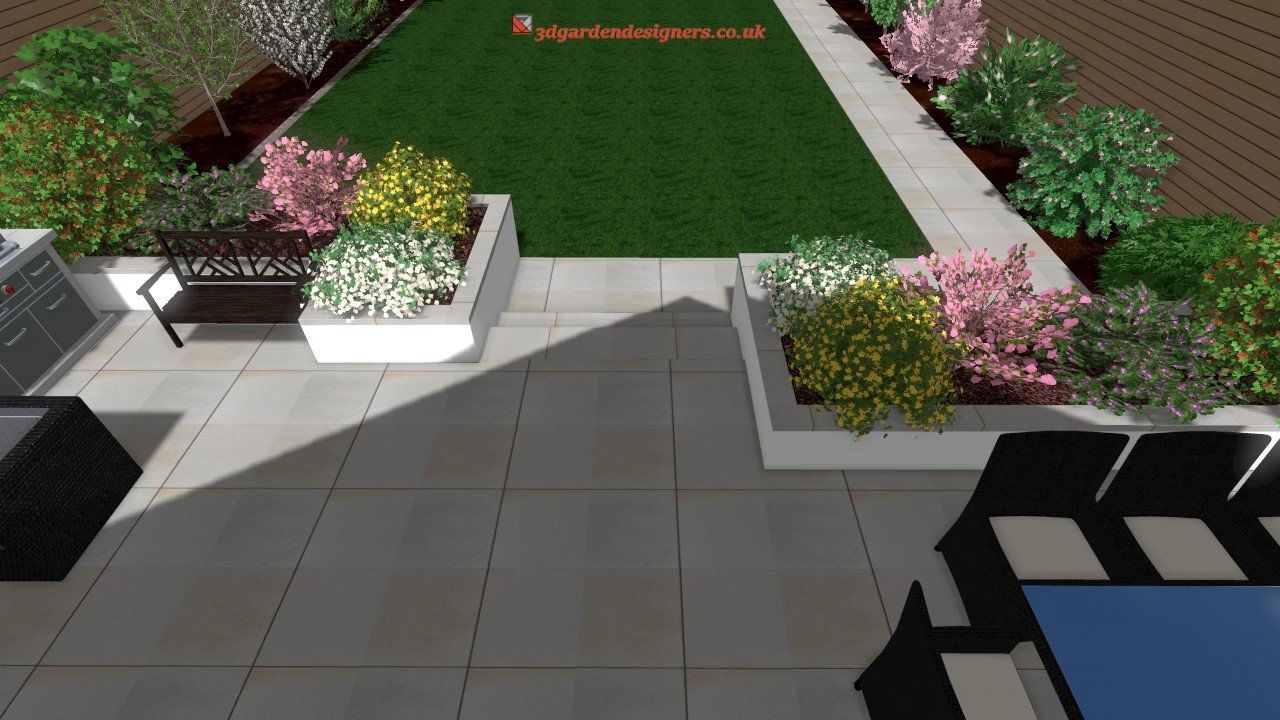 Overhead view of a modern backyard design with a patio, lawn, and flower beds in a garden.