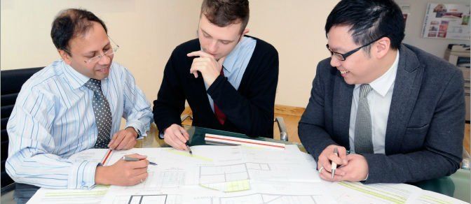 3 men thinking and drawing plans