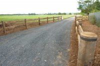 wooden fencing lining road