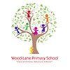 The logo for wood lane primary school shows a tree with children standing on the branches.