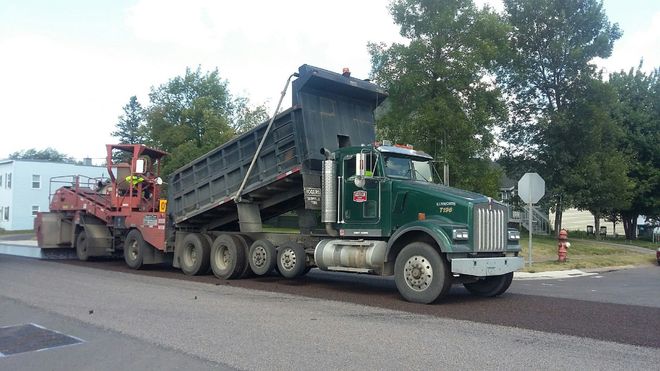 Asphalt Services — Trucks On The Road in Saint Joseph, MN Asphalt Services — Trucks On The Road in Saint Joseph, MN