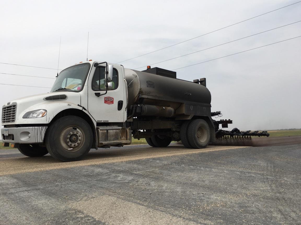 Asphalt Maintenance — Chip Sealing On The Road in Saint Joseph, MN