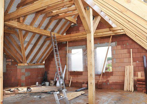 frame being build in brick house