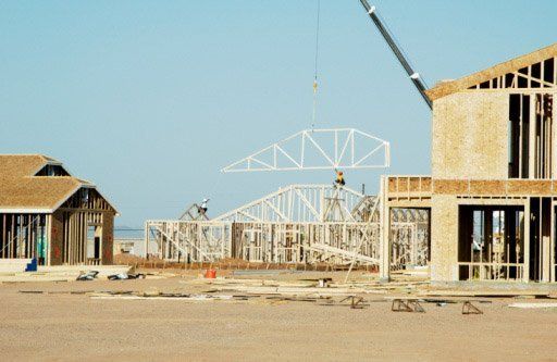 crane helping to assist with building process