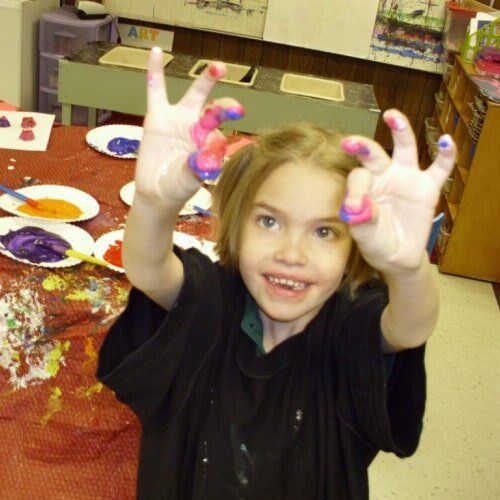 Children doing painting - Child Care in Colorado Sprinigs, CO