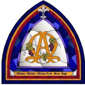 A stained glass window with the letter a on it