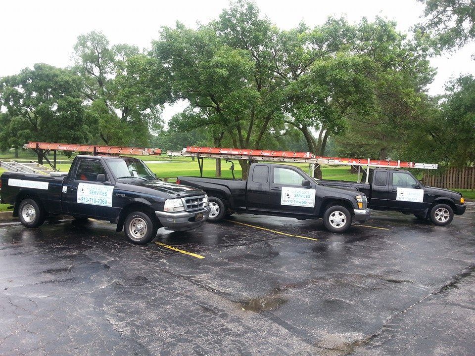 Parked Pick Up Trucks — Overland Park, KS — Clean Gutter Services Parked Pick Up Trucks — Overland Park, KS — Clean Gutter Services