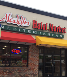 Halal Market storefront with red awning, Mediterranean sign, and glowing OPEN neon sign