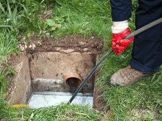 plumber cleaning the drainage plumber cleaning the drainage