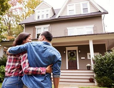 Insurance — Couple In Front Of A House in Morris Plains, NJ Insurance — Couple In Front Of A House in Morris Plains, NJ