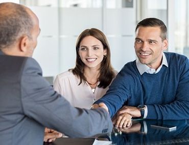 Insurance Coverage — Couple Shaking Hands With Insurance Agent in Morris Plains, NJ Insurance Coverage — Couple Shaking Hands With Insurance Agent in Morris Plains, NJ